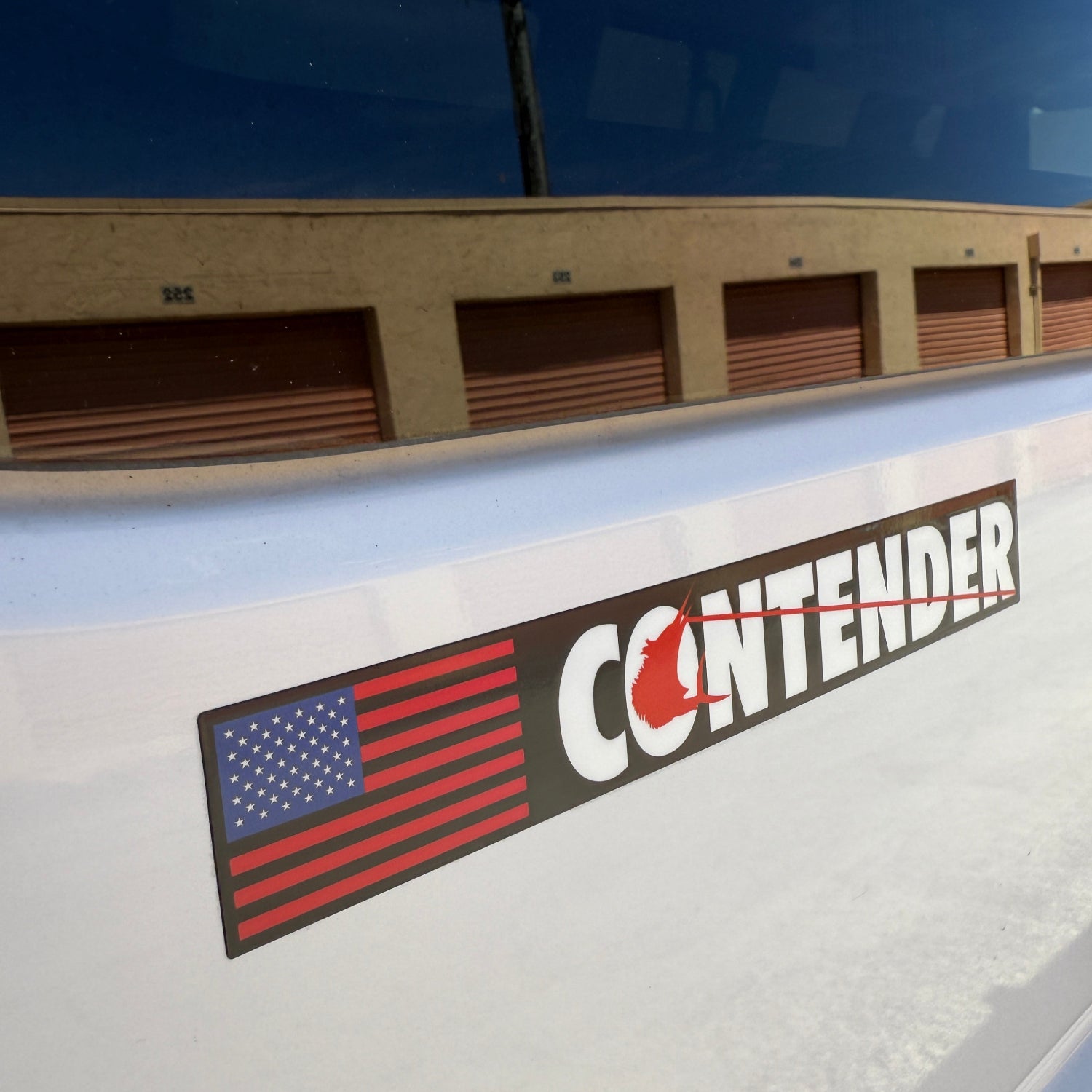 contender boat logo decal black background with white letters and USa flag
